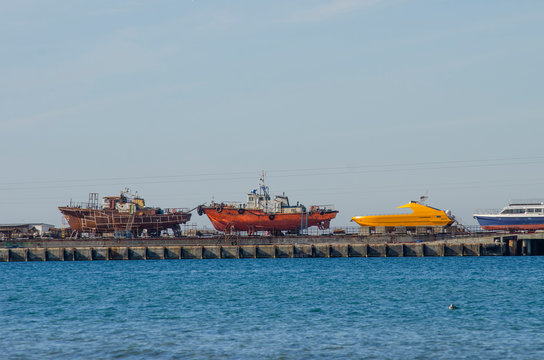 Old fishing boat on the slipway. sea Port in Anapa.