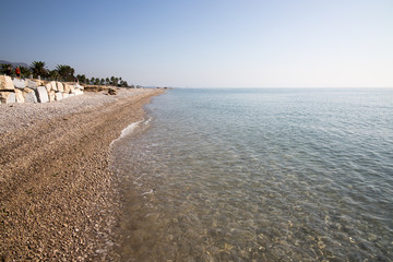Stones on the beach on spanish coast city