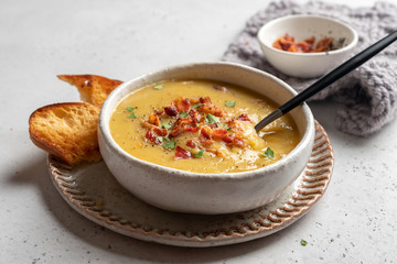 Lentil pea soup garnish with bacon and pork ribs