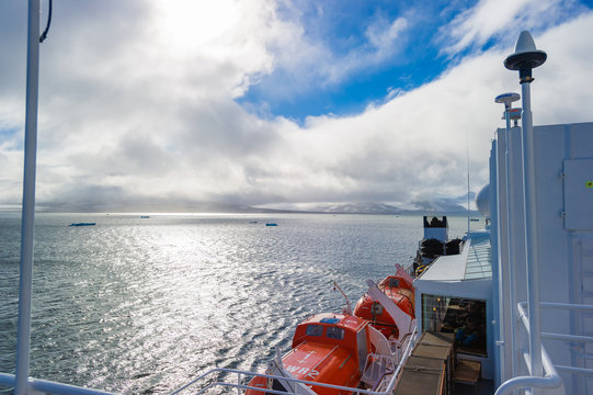 HORNSUND, SVALBARD, NORWAY – JULY 26, 2010:  Photographer On The National Geographic Explorer Cruise Ship In The Arctic.