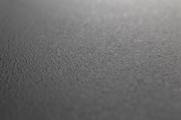 Black plastic texture. Close up.