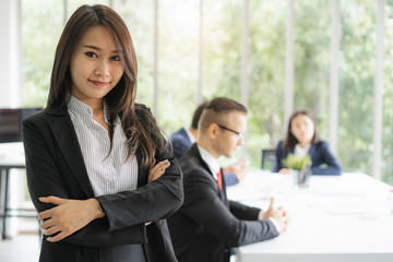 portrait of asian business woman in company meeting room.