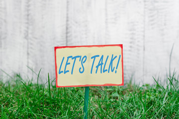 Writing note showing Let S Talk. Business concept for they are suggesting beginning conversation on...
