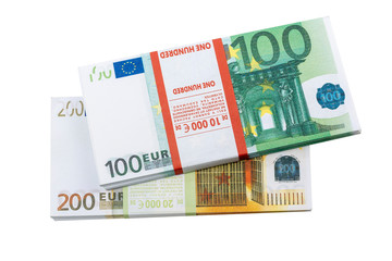 Euro cash in bundles of one hundred and two hundred banknotes, Euro money Euro on a white background, isolated on a white background