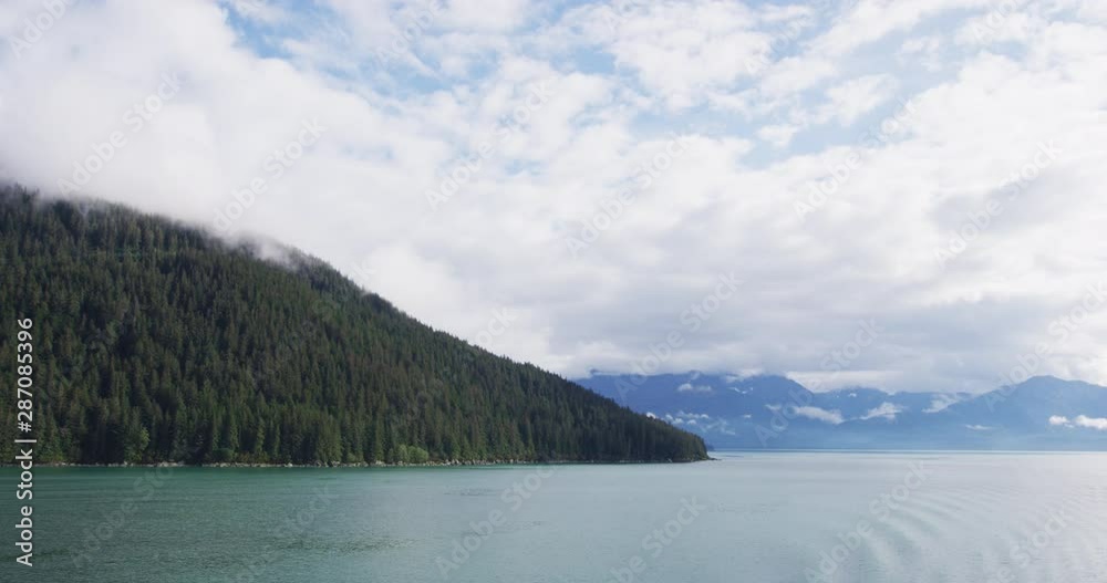 Wall mural Inside passage nature landscape in Alaska seen from cruise ship. Travel tourist destination adventure tour in Alaska