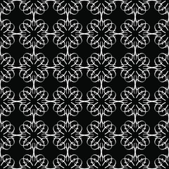 Seamless oriental pattern with Arabic ornaments.  White lines on a black background.