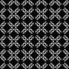 Seamless oriental pattern with Arabic ornaments.  White lines on a black background.