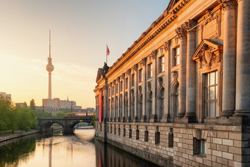 Museum Island on Spree river and tower at background at sunrise in Berlin