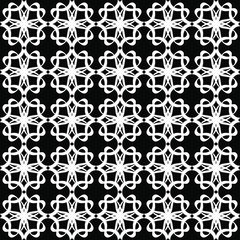 Seamless oriental pattern with Arabic ornaments.  White lines on a black background.