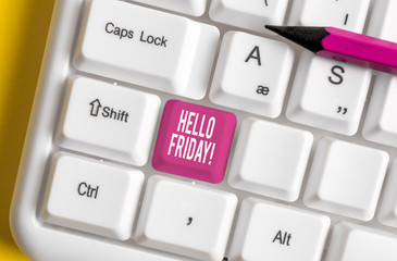 Word writing text Hello Friday. Business photo showcasing you say this for wishing and hoping another good lovely week White pc keyboard with empty note paper above white background key copy space