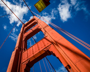 Abstract close up the north tower of the golden gate bridge contrasting with deep blue sky