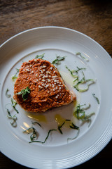 Raw vegan lasagna on a white plate. Dairy free, gluten free food.