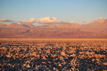 Salt Desert in Atacama Chile wih sunset and Clouds