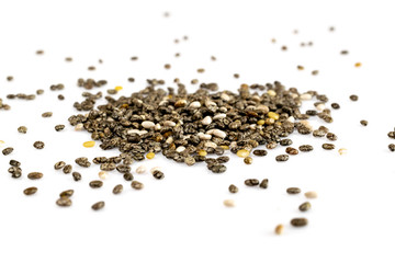 Organic Chia Seed, super food over white background. Healthy breakfast, vitamin snack, diet and healthy eating concept.