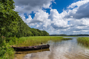 Fototapeta premium Fishing boat on Lake Plateliai in the Samogitia National Park; Lithuania