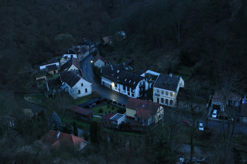 Small town in valley at dusk