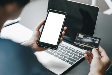 beautiful woman holding credit card using smartphone shopping website online, shopping concept.