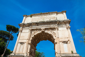 Fototapeta na wymiar The Arch of Titus located on the Velian Hill in Rome