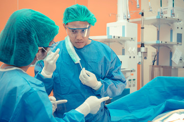 Medical physician doctor or Surgery team in operation room with lighting at hospital