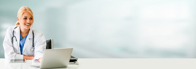 Doctor using laptop computer at the hospital. Medical healthcare and doctor staff service.