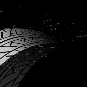black background with tire track print marks © starlineart