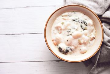 Traditional Italian chicken gnocchi soup in a bowl