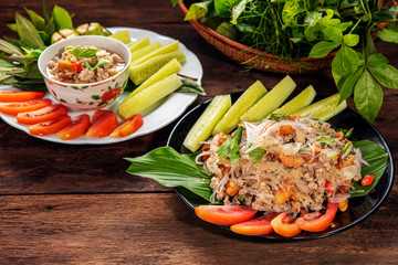 Glass Noodle,Pork,Nut Spicy Salad Thai name Yum Woon Sen  on drak background © mrpratan