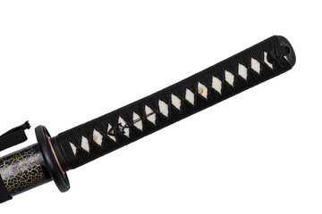 Tsuka : handle of Japanese sword wrapped by black silk cord with black fitting on white ray skin isolated in white background.
