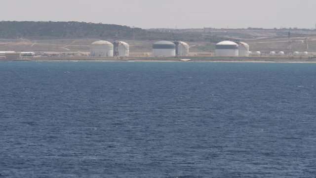 Gas storage tanks on sea shore