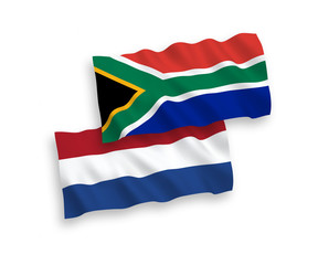 Flags of Republic of South Africa and Netherlands on a white background