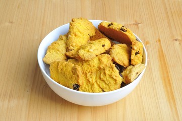 Traditional Italian cuisine cookies on the table with flowers