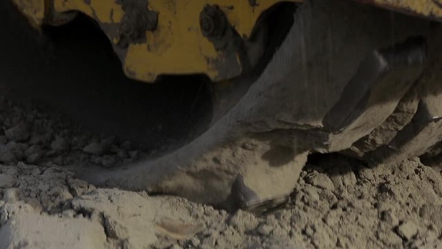 Construction roller produces tremendous pressure on soil, presses the earth