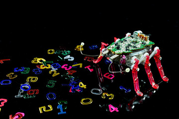 Electronic toy bug insect with antennas with electric circuit board on it's back and scattered numbers around it, conceptual image