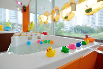 Many little animal dolls for children play and learn on swimming box