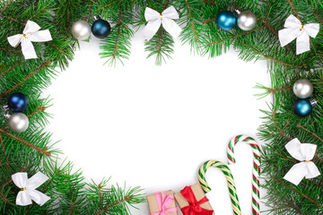 Fototapeta na wymiar Christmas frame decorated with bows and balls isolated on white background with copy space for your text.