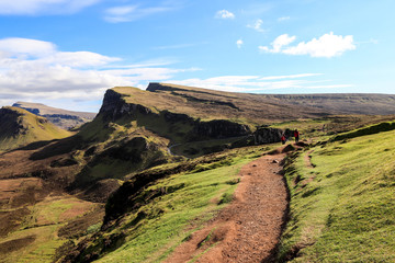 Fototapeta premium Happy family exploring and hiking scenic mountains