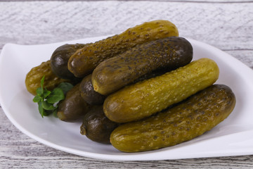 Pickled cucumbers heap in the bowl