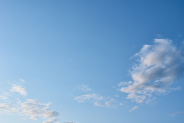 Blue sky with a white clouds, abstract background