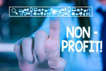 Text sign showing NonProfit. Business photo text not making or conducted primarily to make profit organization Woman wear formal work suit presenting presentation using smart device