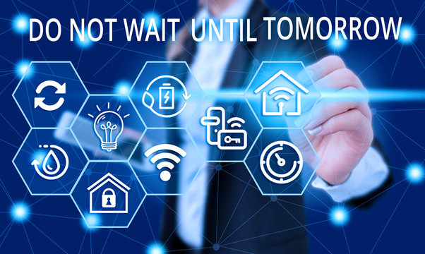 Text sign showing Do Not Wait Until Tomorrow. Business photo showcasing needed to do it right away Urgent Better do now Female human wear formal work suit presenting presentation use smart device