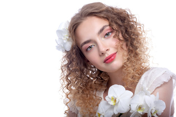 Portrait of a teenage girl with beautiful hairstyle and makeup.