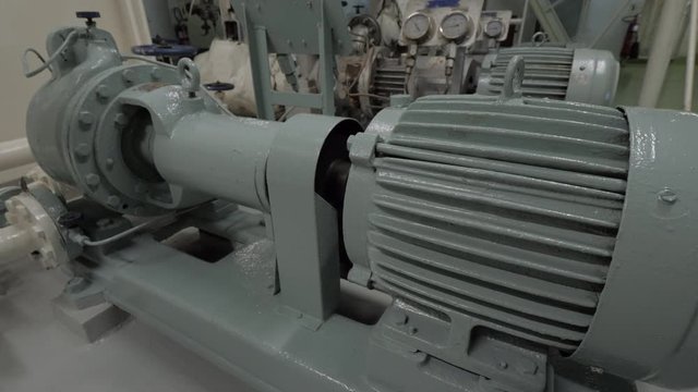 Steam and condensate feed pump with electric motor