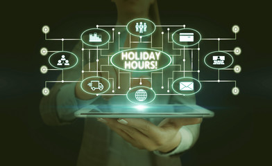 Handwriting text Holiday Hours. Conceptual photo Overtime work on for employees under flexible work schedules Woman wear formal work suit presenting presentation using smart device