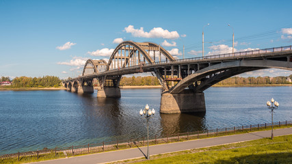 Naklejka premium Bridge across the Volga river in town of Rybinsk, Russia
