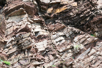 the red brown granite rock for background, texture