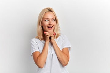 cunning excited girl with wide open mouth dreaming about something, sale, discount concept. facial...