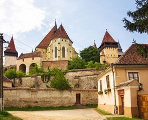 Fototapeta na wymiar Castle in the village of Lazarea, Romania on August 8, 2019