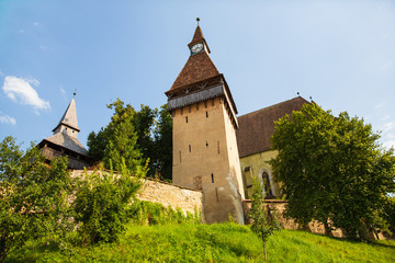 Fototapeta na wymiar Castle in the village of Lazarea, Romania on August 8, 2019