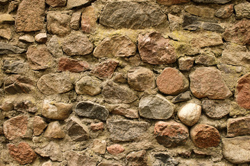 Fototapeta na wymiar Antique brown textured old stone wall background