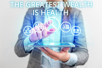 Conceptual hand writing showing The Greatest Wealth Is Health. Concept meaning Many sacrifice their...